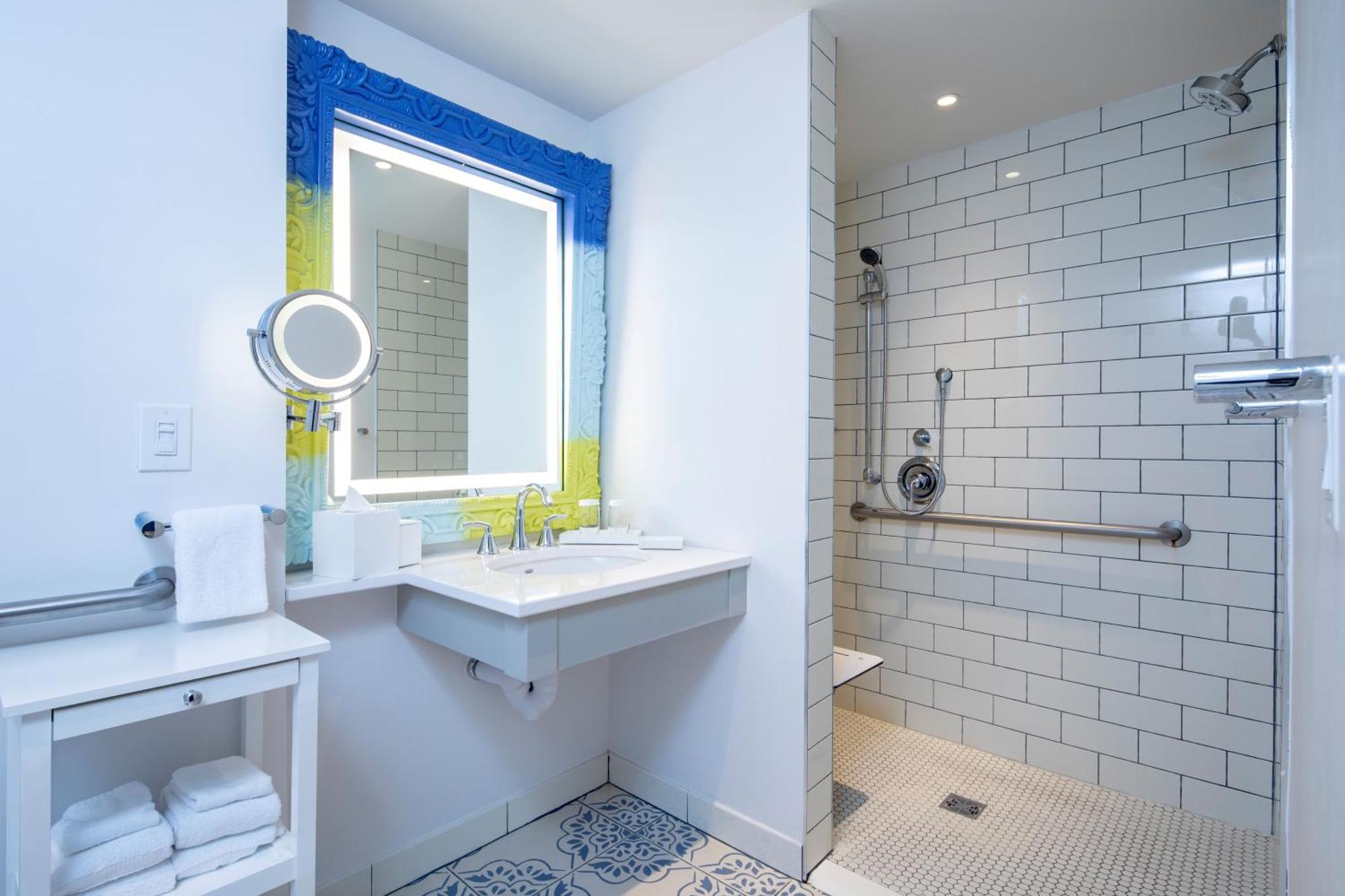 Mobility Accessible Standard 2 Queen Room w or roll shower Includes Early Park Admission*