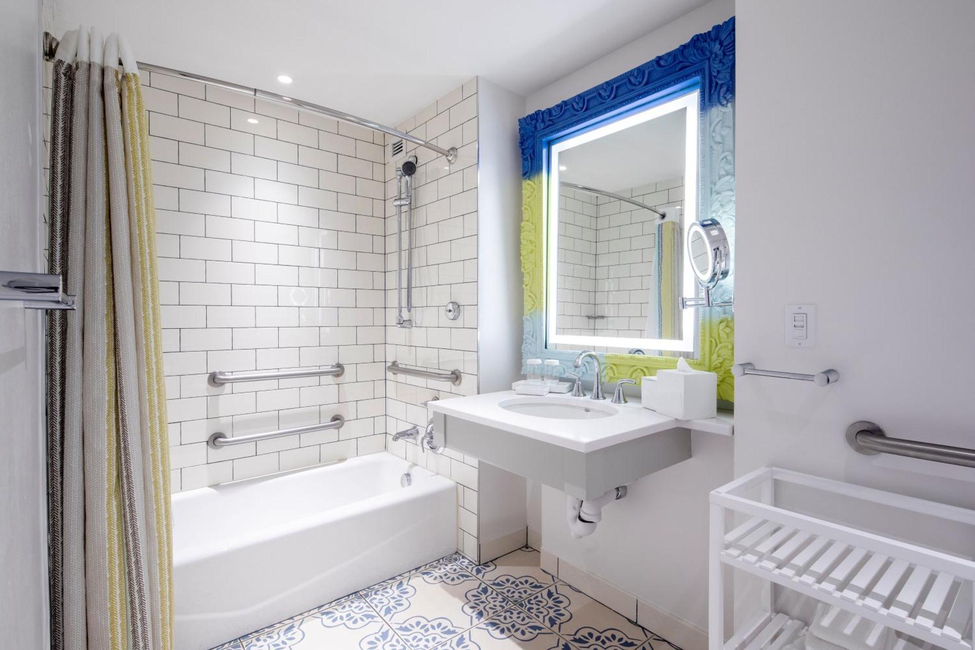 Mobility or Hearing Accessible Pool View 2 Queen Room w or ADA tub Includes Early Park Admission*