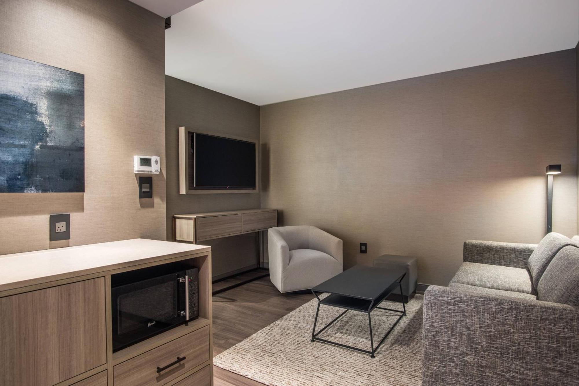 One-Bedroom King Suite with Sofa Bed and City View,1632294160:JPEG