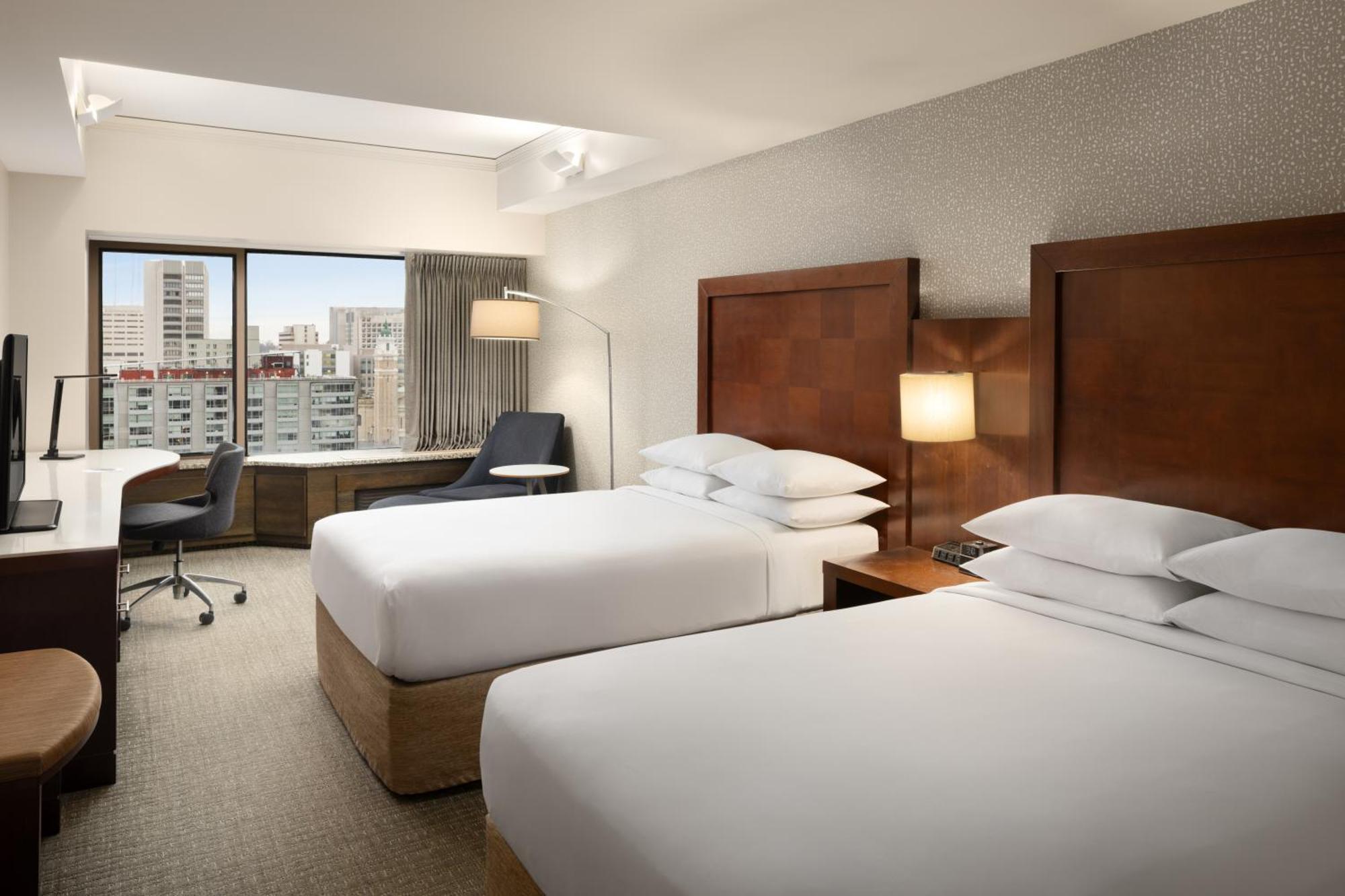 Guest Room Two Double Beds City View