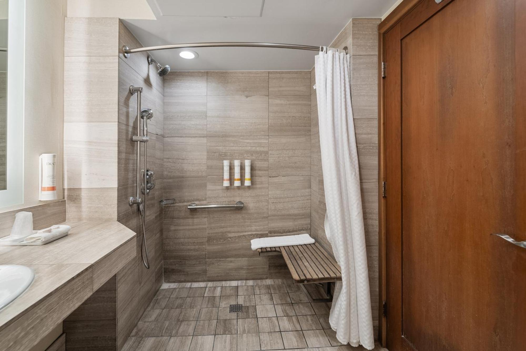 Standard Queen Non View Accessible Room Roll Shower