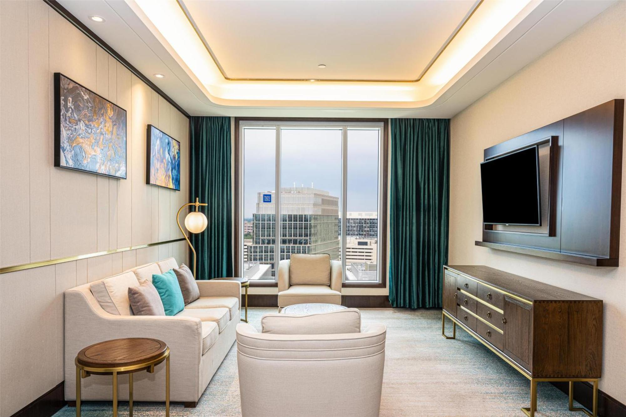One-Bedroom Corner Suite One King Bed Roll Shower Mobility Accessible