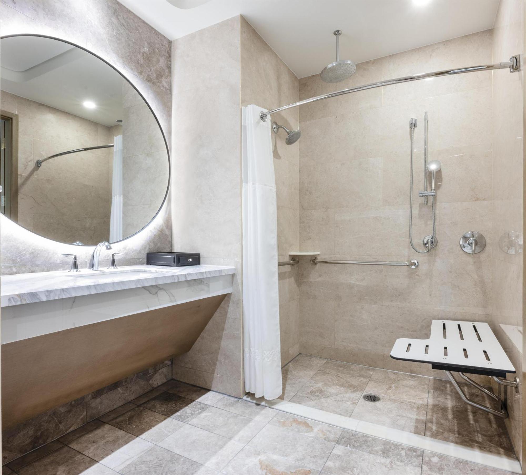 One-Bedroom Corner Suite One King Bed Roll Shower Mobility Accessible